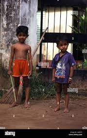 Portrait of two little boys standing outside their home in Sri Lanka Stock  Photo - Alamy