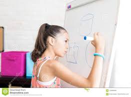 Girl Drawing Geometric Shapes On Flip Chart Stock Photo