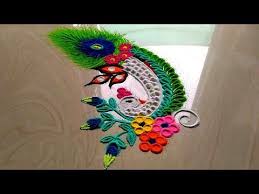 How To Make Peacock Rangoli Design Ganesh Chathurthi Spacial Rangoli Designs Peacock Feather Rangoli Colorful Rangoli Designs Rangoli Designs Rangoli Patterns