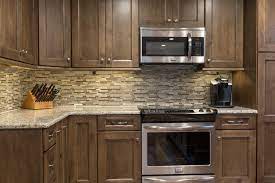 In the event that you are getting white cabinets crafted from wood then you will need certainly to give particular attention to them. Contemporary Kitchen With Neutral Tile Backsplash And Dark Wood Cabinets Hgtv