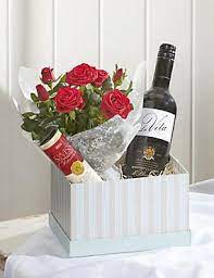 I am looking to send a bottle of wine and some balloons to my partner in usa. Bouquets Of Flowers Peony Rose Bouquets Wine Gifts Mother S Day Gift Baskets Chocolate Gifts Basket