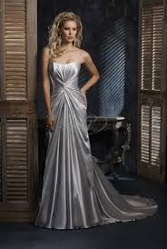 These wedding dresses are pure magic. Maggie Sottero Jamie Gown 849 Satin Wedding Gown Silver Wedding Gowns Silver Wedding Dress