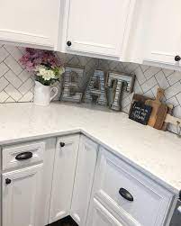 The kitchen countertop is the perfect place to add the ultimate design touch to your kitchen. Kitchen Remodel Modern Farmhouse Farmhouse Style Farmhouse Decor White Kitchen Subway Tile Herrin Home Decor Kitchen Rustic Modern Kitchen Rustic Kitchen