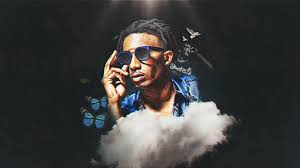Alisonbonnin24 bunny wallpaper wallpaper aesthetic. Playboi Carti Is Holding Goggles With Hand In Black Background Wearing Blue Printed Shirt Hd Music Wallpapers Hd Wallpapers Id 42746