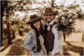 There were plenty of classic hoedown activities, like apple bobbing and hay rides. Western Wedding Inspiration Western Wedding Photographer Native Roaming Photography