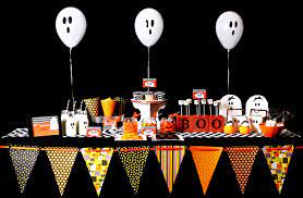 Add the color white to the traditional halloween colors (orange and black) to add a little class. Halloween Party Ideas Godfather Style