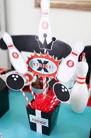 Host your birthday at the bowling alley and use bowling party supplies for a fun themed activity party. Boys Bowling Themed Birthday Party Food Party Table Centerpiece Decoration Ideas Bowling Birthday Party Bowling Party Decorations Bowling Party Themes
