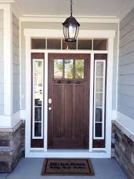 Go For A Rich Dark Wood For Your Front Door To Make A Statement Pairing It With A Soft Grey Exterior Pai House Exterior Best Front Doors Exterior Front Doors