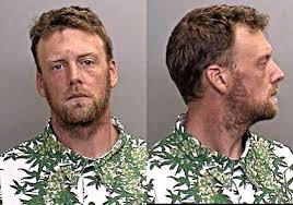 Towel-wearing man mixes drinks, tries to start fights