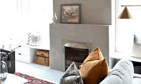 Want to renovate or makeover your fireplace? Diy Concrete Fireplace Makeover Houseologie