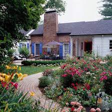 Keep new plantings watered and mulched. How To Landscape Your Yard Better Homes Gardens