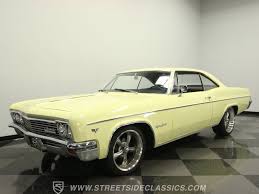 Image result for Canary Yellow 1966 AC Cars
