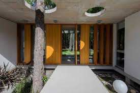 As a recent trend, designers are coming up with creative ways to give an ordinary house plan a unique look, and as a result, plans. Homes Built Around Trees 13 Creative Examples