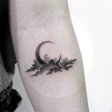 If it is your first time to be inked, or if you plan to add more design on your skin, moon tattoos are certainly something that you must consider. Simple Moon And Clouds Tattoo Novocom Top