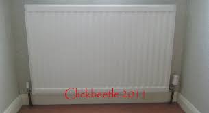 How To Remove Wallpaper From Behind A Radiator Removable Wallpaper Stripped Wallpaper Removing Old Wallpaper