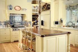 A bright blue kitchen with a bright mosaic tile backsplash and bold touches of yellow here and there is super cool. Kitchen Ideas Light Yellow Kitchen Ideas