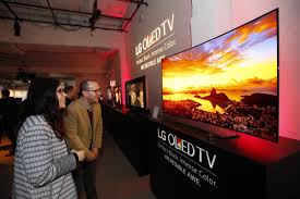 Lg S Spending Billions To Make More Oled Things Lg S Oled 4k Tvs Are Jaw Droppingly Gorgeous But The Price Still Isn T Anywhere Near Oled 4k Tv Oled Tv 4k Tv