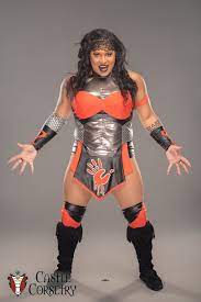 Aew Revolution Nyla Rose Shows Off Awesome Deathstroke Inspired Gear Deathstroke Dc Cosplay Wrestling Costumes