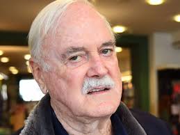 Monty Python legend John Cleese's 'mic taken away as he makes controversial  joke'