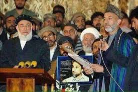 نتیجه تصویری برای انتقال قدرت از استاد ربانی به حامد کرزی