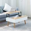 White lift top coffee table with hidden storage shelf and 2 drawers. 1