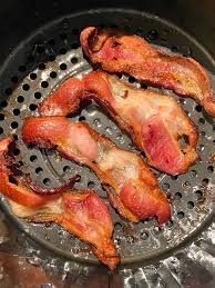 Keep flipping and turning the bacon so that it browns evenly. Air Fryer Bacon Melanie Cooks