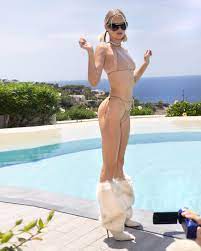 Model Elsa Hosk stuns as she models a nude bikini and knee high fur boots |  The Irish Sun