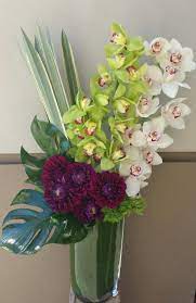 40 Amazing Orchid Arrangements Ideas To Enhanced Your Home Beauty Orchids Orchid Flower Arrangements Tropical Flower Arrangements Flower Arrangements Simple