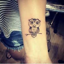 Cute and lovely small quirky owl tattoo design on wrist. Cute Little Owl Owl Tattoo Small Cute Owl Tattoo Small Tattoos