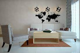 Rustic wooden trunk coffee table topped with industrial decors and surrounded by three modern lounge chairs. 10 Brilliant Living Room Wall Decor Ideas Design Cafe
