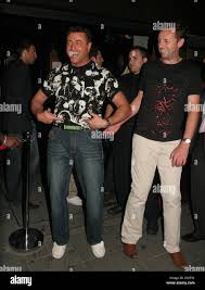 Mario Marconi leaving Embassy nightclub wearing a flashing belt with his  girlfriend Lisa'a name