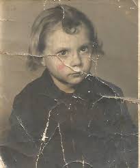 This is my mom and dad can you clean this pic up, I'm sure it's from early  60's