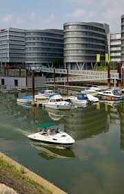 The innenhafen (inner harbour) in duisburg, germany, is connected to the rhine river, encompasses an area of 89ha.for over a hundred years during the high point of the industrial revolution, it was the central harbour and trading point of the town.since the mid 1960s, the importance of the harbour declined and it lay in a disused condition for 20 years, before plans for renovation were drawn up. Inner Harbour Duisburg Germany Photograph By David Davies