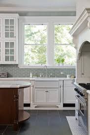 Kitchen With White Cabinets Aqua Beadboard Walls And Aqua Subway Tile Backsplash Ar Cottage Kitchen Backsplash Kitchen Design Decor Home Kitchens
