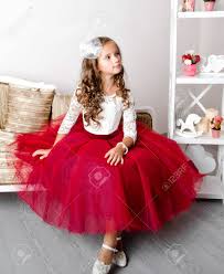 Check out our robe princess petite fille selection for the very best in unique or custom, handmade pieces from our shops. Adorable Petite Fille Souriante En Robe Princesse Assise Sur Le Canape Banque D Images Et Photos Libres De Droits Image 84051110