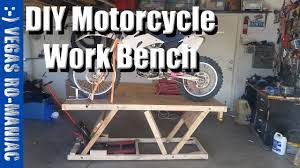 Homemade motorcycle lift constructed from 3/4 plywood, gi pipe, and wooden planks. Diy Home Made Wooden Motorcycle Lift Stand Table Under 20 Almost Ready Youtube
