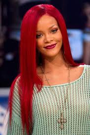 The punch of red in her hair gives her enough of a punk vibe without detracting from her natural beauty. 8 Rihanna S Red Hair Ideas Rihanna Red Hair Red Hair Day Hair