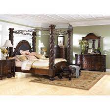 Its headboard and footboard areas are carved for better aesthetic value. North Shore 5 Piece King Poster Bed Set B553 Kbed 131 36 46 193 Ashley Furniture Afw Com
