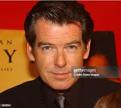 Irish actor Pierce Brosnan gestures as he arrives for the after party...  News Photo