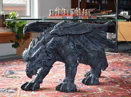 24.5'' h x 9'' w x 9'' d. Warwickshire Dragon Glass Topped Coffee Table Paolini