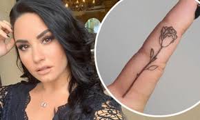 Tattoo stories with demi lovato. Demi Lovato Shows Off New Rose Tattoo To Mark Six Months Of Sobriety Daily Mail Online