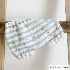 Knitted drops skirt with lace pattern in delight. Spring Summer Models Patterns Katia Com