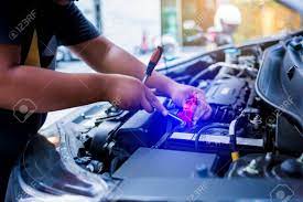 You can expect the same great mobile car repair service and even more when you book a service with wrench. Blurry Of Male Mechanic Changing Car Battery Mechanic Engineer Stock Photo Picture And Royalty Free Image Image 121946737