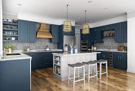 The warmth of the orange accents is tempered by the cool blue and brick tones. Buy Imperial Blue Frameless Kitchen Cabinets Online