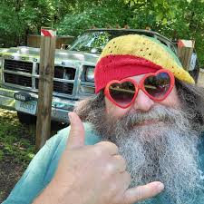 Enjoying everything about Plum Hollow...the people, the party, the music.  Errrrbody showing the love! Www.moonshiners.com