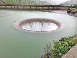 Lake Berryessa's famous Glory Hole spills over after weeks of rain
