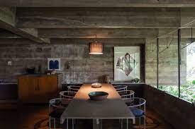 The rooms, set up as small apartments, are arranged in the middle of the house, and their windows are on the ceiling. Paulo Mendes Da Rocha Leonardo Finotti House In Butanta Divisare