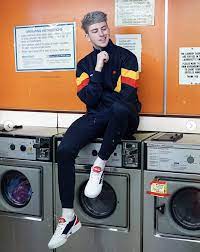 How To Cop The 80s Sportswear Look With Gallucks Wearing Ellesse Tracksuit Mens Street Style 80s Fashion Men Mens Outfits