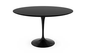 This dining table and its natural wood grain finish completes your dining room's look no matter the style. Knoll International Saarinen Round Dining Table 120 Cm Black Laminate Black By Eero Saarinen 1955 1957 Designer Furniture By Smow Com