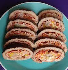 This Pizza Log Is Easy To Make And A Perfect Way For Those Special Helpers This Time Of Year Pizza Logs Food Comfort Food